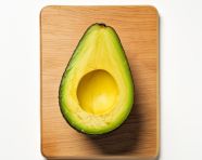 Half avocado on white background, avocado image stock photo