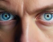 Closeup of a man with blue eyes, men eyes close up image