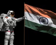 An astronaut stands near the astronaut with india flag, chandrayaan with indian flag