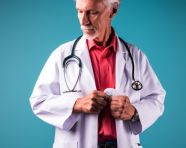 Doctor in white coat with stethoscope, medical images stock