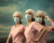 Medical team posing in protective gear, medical images stock