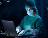Female doctor using laptop in hospital, medical images stock