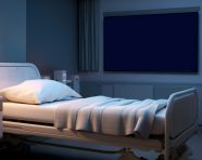 A hospital bed next to a monitor, medical images stock