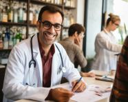 Doctor and patient discussing treatment options, medical images stock