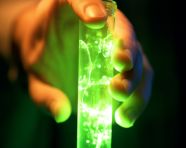 A close-up view of a scientist's hand holding a test tube, medical images stock