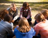 Friends holding hands in circle, mental health