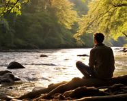 Woman enjoying nature sounds by river, mental health