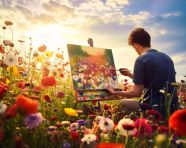 A wide-angle shot of a person painting in a field of flowers, mental health