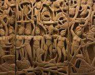 Carvings of gods and goddesses on temple wall, bas relief art