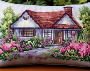 Cross stitch cottage pillow, cross stitching style art