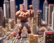 Bodybuilder flexes biceps