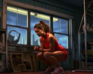 Female athlete squats with dumbbells