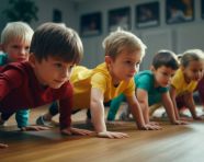 Children practicing pushups in fitness center