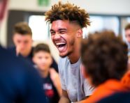 Laughing child playing with dog