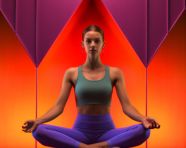 Female woman in yoga pose on bright colorful background