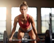 Female bodybuilder deadlifting