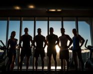 Fitness people group in silhouette window