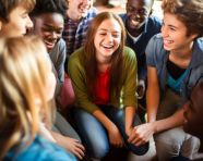 A group of students are sitting in a circle