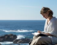 Woman reflects on ocean views