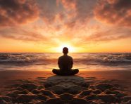 Woman watching waves roll in