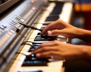 A close up of a students fingers typing on a keyboard
