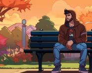 Young man in hoodie sitting on park bench