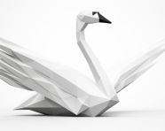 An origami swan on top of a white background