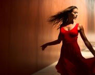 Red dress dancer in motion