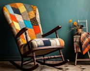 Colorful rocking chair with a hand quilt