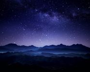 The milky way stretches across the horizon