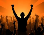 Speaker addressing crowd