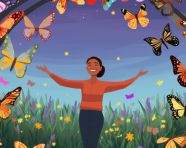 A person is standing in a field of flowers