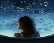 Woman relaxing in bubble bath