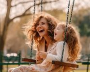 Girl and mom having a blast at the park