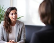A person sitting in a therapists office