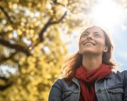 Senior citizen sitting in park