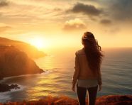 Woman stands tall against the horizon