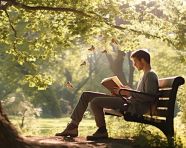 Man thinking deep thoughts on a park bench