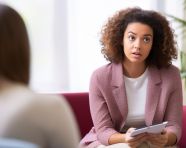 Young woman seeks help from therapist