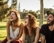 Friends chatting on park bench