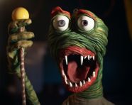 He monster puppet with tongue sticking out