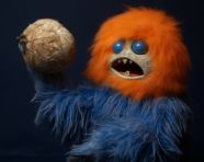 Blue and orange toy with head