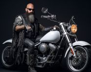 Biker fashion model riding motorcycle