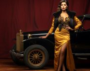 Glamorous 1910s fashion model in full body outfit